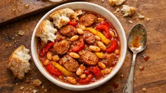One-pot sausages with beans, peppers and rose harissa – a cosy weeknight supper