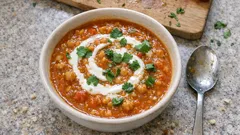 Red lentil, chickpea & chilli soup — a quick one-pan bowl with yoghurt and coriander