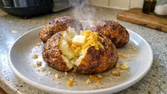 Air fryer jacket potatoes with crisp skins and fluffy middles (no oven needed)