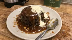 Ultimate sticky toffee pudding with silky toffee sauce (made with dates and treacle)