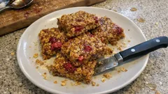 Raspberry Honey Flapjacks – a buttery traybake that slices neatly every time